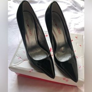 Black pointy toe high heels
